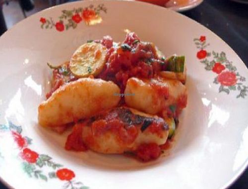 Potato Gnocchi with Spicy Ragu: Pan-crisped potato dumplings with a ragu of summer squashes, hot peppers, and tomato-basil sauce at Portobello Vegan Trattoria in Portland