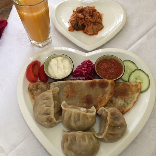 Monoglian Combo, Seabuckthorn Juice, and Kimchi at Bilig Vegan Bistro in Ulaanbaatar