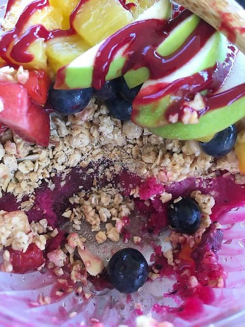 My Banzai Bowl 1/2 eaten so you can see the layers of sorbet, granola, and fruit. So good! at Al's Aloha Kitchen in Hilton Head Island