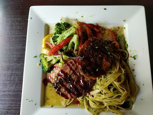 Raspberry pistachio ";chicken"; w/ veggies and pesto pasta at Marco Polo Global Restaurant in Salem