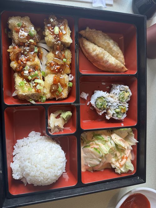 They were super accommodating! They made my California roll without crab meat and switched my pork dumplings for vegetable. This the teriyaki tofu lunch box!   at Koja Cuisine in Easton