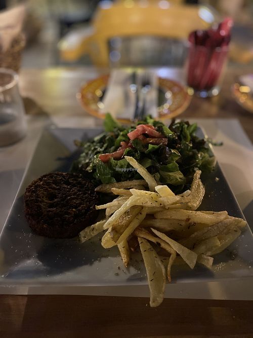 Lentil burger with chips & salad  at Let's Vegan in Crete