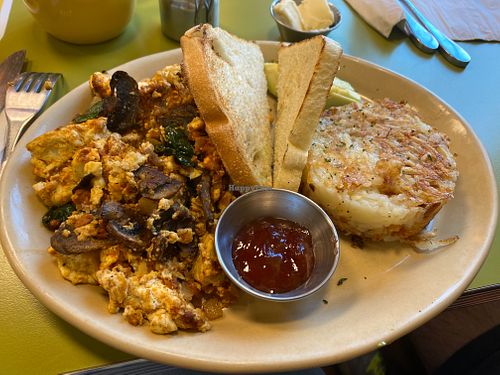 Tofu scramble with mushrooms, onions, spinach, and soyrizo.  at Snooze in Charlotte