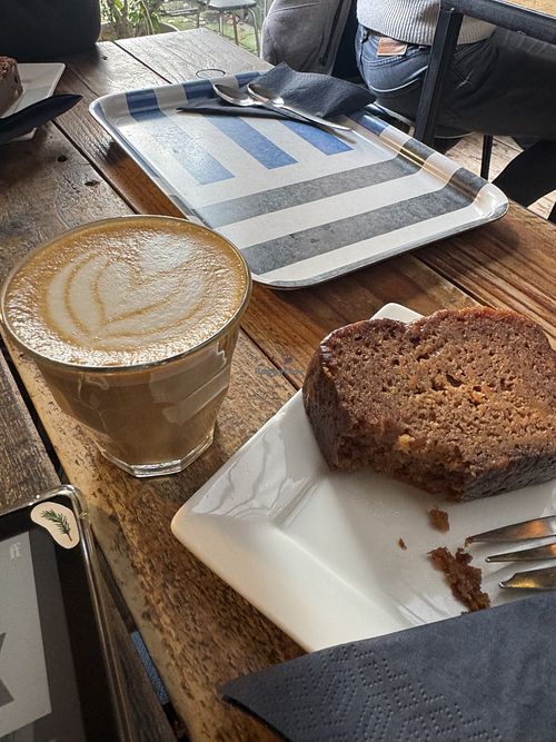 Delicious vegan carrot cake and great coffee.  at Koffie Academie in Amsterdam