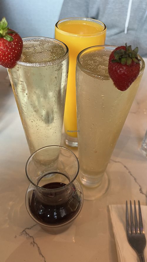 Mimosas, Orange Juice, Pomegranate Juice  at The Broken Yolk Cafe in San Diego
