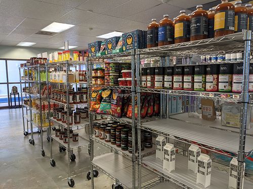 Clean spacious well organized aisles at VegSide Mkt in Houston