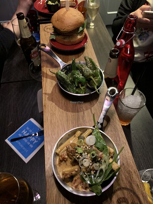 Vegan pasta, padron peppers, burger.  at Pinchos in Helsinki
