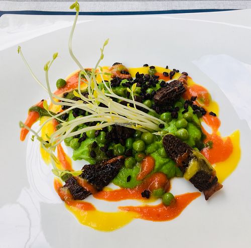 Pea puree with marinated peas, pea asparagus sprouts, morels and peperonicoulis at MythenForum in Schwyz