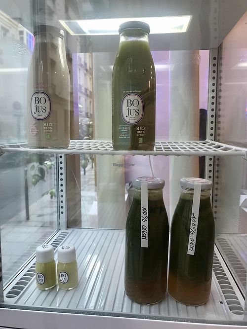 fridge with fresh juices and shots  at Bojus in Paris