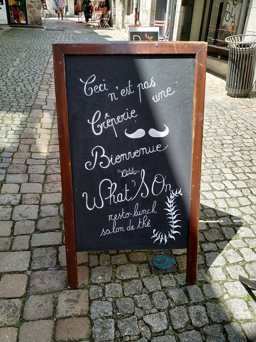 the sign outside at What's On in Quimper