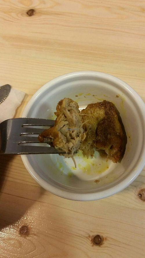 Tasting the mutton from the curry! Very good. at Aubergine in Cardiff