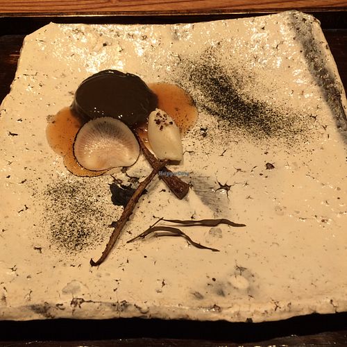 yin and yang: black sesame tofu, lily bulb paste w/ cacao nibs, kuzu, daikon at Kajitsu in New York City