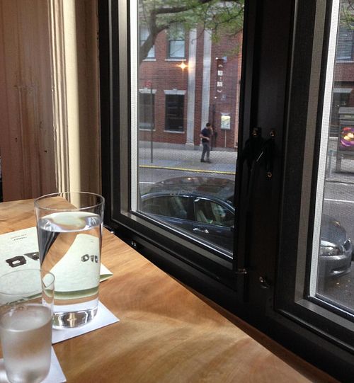 View of city life from restaurant at Kajitsu in New York City