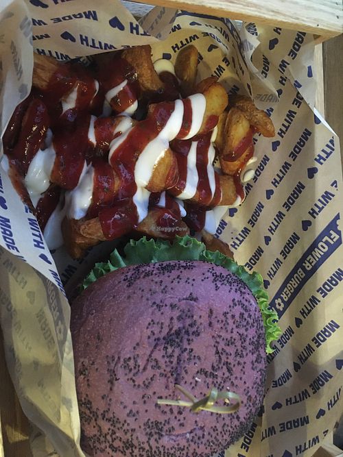 Cheesy chickpea burger and patatas bravas  at Flower Burger in Marseille