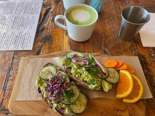 Avocado Tartine with a plant milk matcha latte at Jus Organic in Highlands