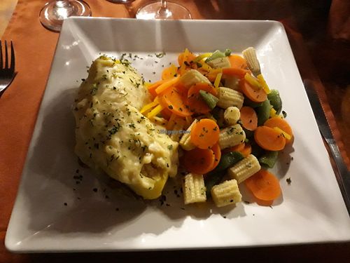 Baked potato with rice filling and steamed vegetables.  at Rancho Grande in Villa General Belgrano