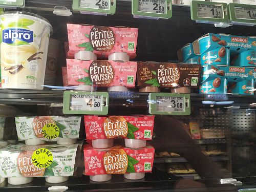 vegan yogurts in the fridge at Carrefour City in Levallois-perret