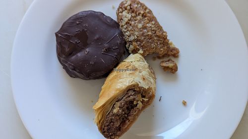 Sweets: wagon wheel (GF), cookie (partially eaten) and baklava at Staazi & Co in Adelaide