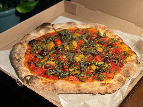 Slightly modified Vegan Margherita pizza special. I subtracted the roasted garlic and added kalamata olives. at The 4th Horseman in Long Beach