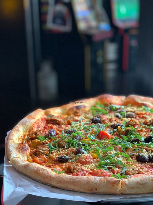 FRAILTY PIZZA
House tomato sauce, roasted peppers, kalamata olive, caramelized onion, cherry tomato, fresh basil
vegan Parmesan - $1.50
vegan Italian sausage crumbles - $3 at The 4th Horseman in Long Beach