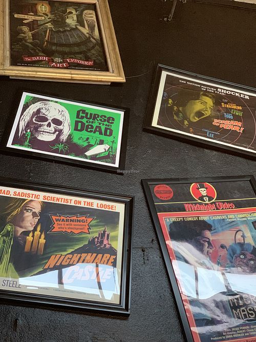 Framed Posters in Lobby at The 4th Horseman in Long Beach