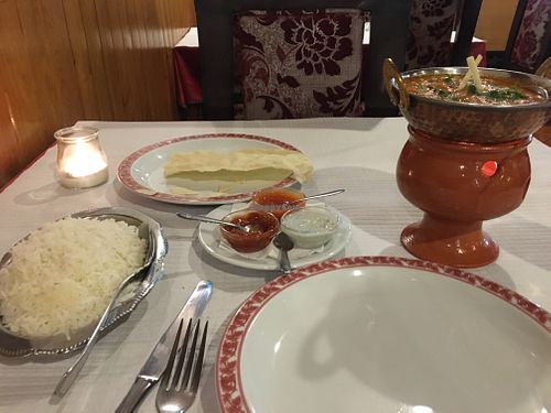 Coconut rice + mushroom and peas sauce ! at Natraj Indian Tandoori in Quarteira