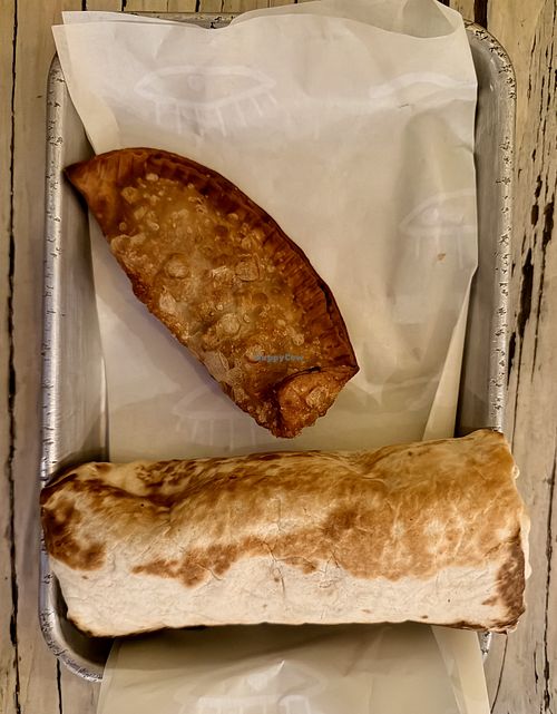 Burrito and empanada   at Izzy Rose in Brooklyn