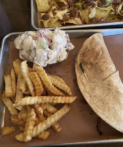 Sriracha Brat was good but I hated that pita. A vegan bun isn’t hard to find    at Smokee Mo's St Louis BBQ in St Louis