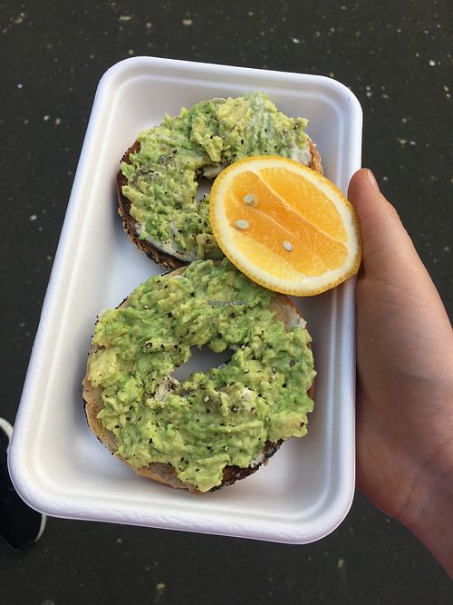 Avo bagel with vegan cream cheese underneath  at Hussey & Laredo in Dunedin