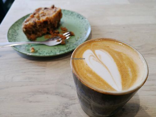 Flat white with carrot apple tea crunch at Canopy in Guildford