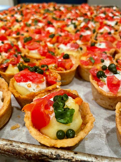 Savory tart with roasted garlic mashed potato, basil pearls & marinated basil tomatoes at Weimar Institute Cafeteria in Weimar