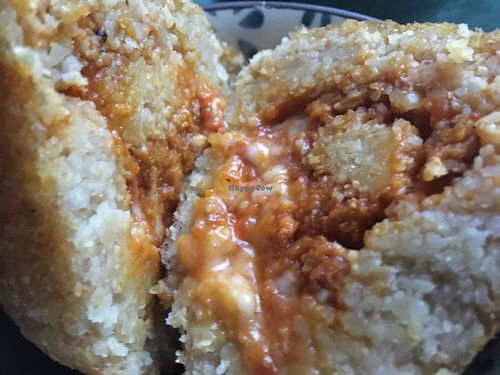 Bulgur arancino filled with soy ragù  at Leccornie in Milan