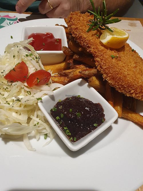 March special: Schnitzel with fries, jam and cabbage salad, delicious and crispy! at Green Flamingo in Innsbruck
