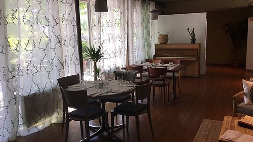 Café and Piano corner at Le Café de Chavannes in Chavannes-pres-renens