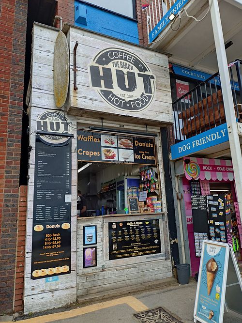 Vegan ice creams advertised on A board and on shop front. at The Beach Hut in Filey