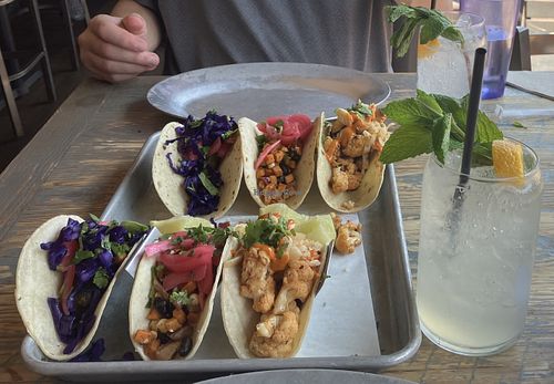 Veganized veggie tacos (avocado, sweet potato, and cauliflower) and mocktail mojito  at Vida Taco Bar in Annapolis