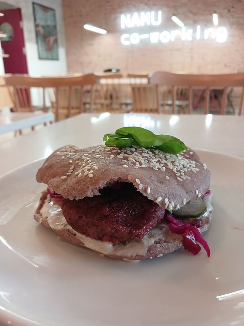 The Burger with Buckwheat patties, kimchi, cashew tahini dressing, mint and cucumber. Yum! So good at Namu ნამუ - Online in Tbilisi