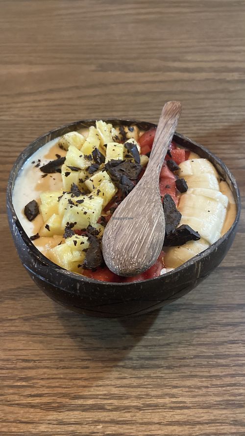 Chocolate smoothie bowl (minus cocoa powder, plus coconut flakes🤭) it’s bigger than it looks  at Ngon Vegan Restaurant in Tam Coc