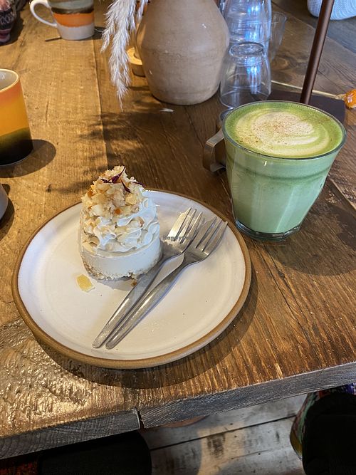 Rose & pistachio cheesecake, Matcha latte 💚  at The Hairy Barista in Totnes