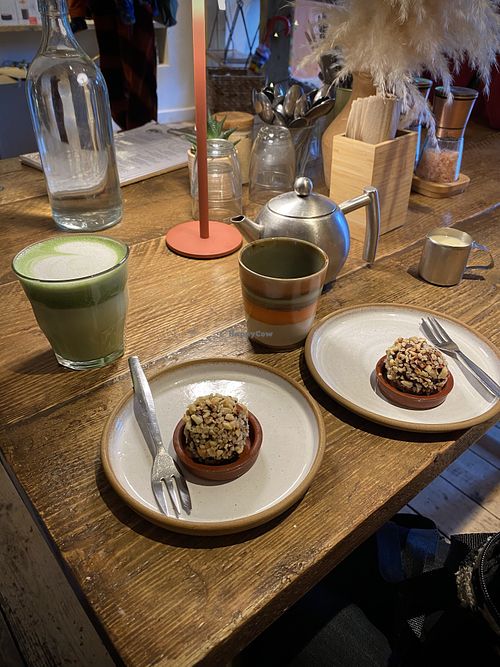 Matcha Latte 💚 & toasted hazelnut, chocolate praline balls 🤎  at The Hairy Barista in Totnes