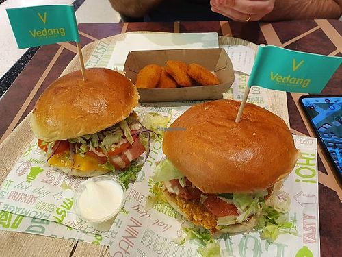 Cheeseburger with extra bacon plus Crispy chicken with extra bacon and vegan nuggets 💚 at Vedang - green burger | Alexa in Berlin
