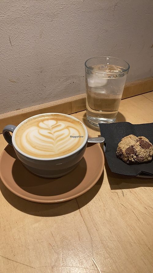 oat milk latte and vegan cookie   at Melt Cafe in Zagreb