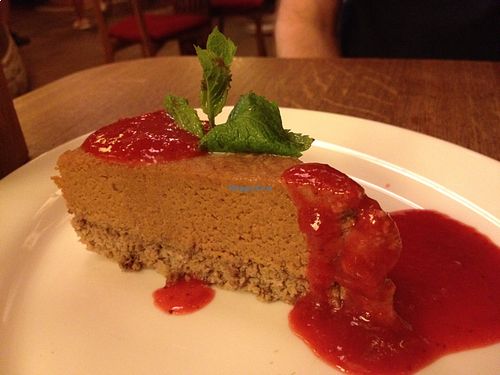 Raw cheesecake with fruit coulis at Maitrea in Prague