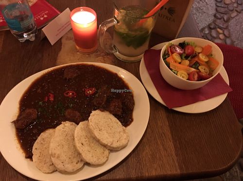 Goulash with dumplings; side salad and handmade lemonade.  at Maitrea in Prague