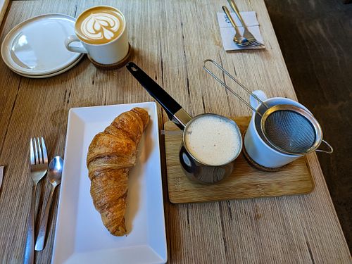 Cappuccino, Croissant, and Chai Latte at Plant Base at Plant Base in Berlin