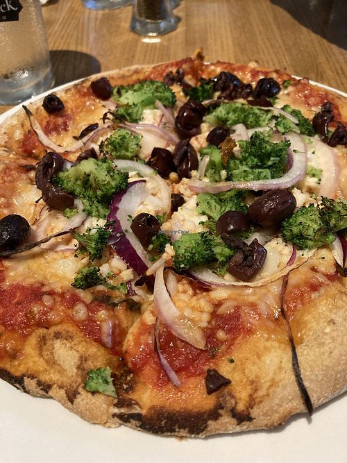 Vegan and gluten free pizza with customized toppings  at Piecasso in Stowe