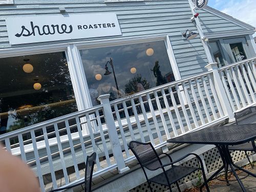 Outdoor dining area at Share Roasters in Amherst