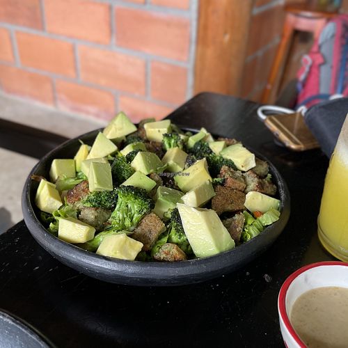 Salad is a MUST. Roasted broccoli, a mountain of impeccable avocado, almonds and Brazil nuts, tangy dressing, and the home-made veggi protein is like a fluffy falafel.  at Revolucion Bananera in Jardin