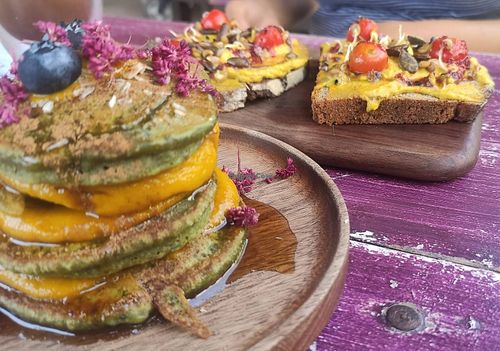 1)Vegan Pancakes from chia-my friend is intolerant to nuts so they added marmelade instead of hazelnut. 
2) Vegan toasted bread with seeds, cherry tomatoes and a great curry spread at La Panateria in Barbate