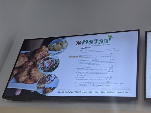 Menu board at Majani #2 in Chicago